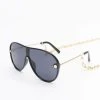URBAN CLASSICS Herren Sonnenbrille Sunglasses Naxos With Chain In Schwarz
